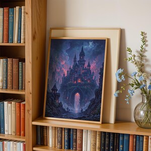 May include: A framed art print of a fantasy castle, set against a dramatic sky with purple and pink hues. The castle is lit with glowing lights. The print is displayed on a wooden shelf, next to a bookshelf and a vase of blue flowers, creating a decorative display.