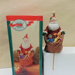 Hallmark Vintage Santa Clause Christmas  stocking holder hanger 1982 in box excellent Looking at the List bell on hat