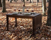 Drop Leaf Dining Table. Extension Dining Table. Mosaic Kitchen Table. quot Stained Glass quot Mosaic. 30w x 70l x 30t. Medium Cognac Brown Finish.