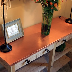 Large Console Table. Copper Console Table. Copper Top Table. Wood & Copper Sofa Table. Hickory Table. 48 l x 16 d x 30 t. Clear Coat Finish.