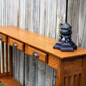 Mission Sofa Table. Mission Style Console Table. Arts and Crafts Sofa Table. Console Table. 58 w x 12 d x 34 t. Light - Medium Brown Finish