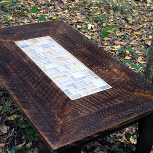 Mosaic Tile Coffee Table. Wide Frame Coffee Table. Neutral Centerpiece Table. "Desert Beach" Mosaic. 38"l x 24"w x 17"t. Dark Brown Finish