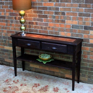 Console Table.  Copper Sofa Table.  Dark Sofa Table. Entry Table. Copper Centerpiece. 45 w x 12-1/4 d x 30 t. Dark Brown Finish