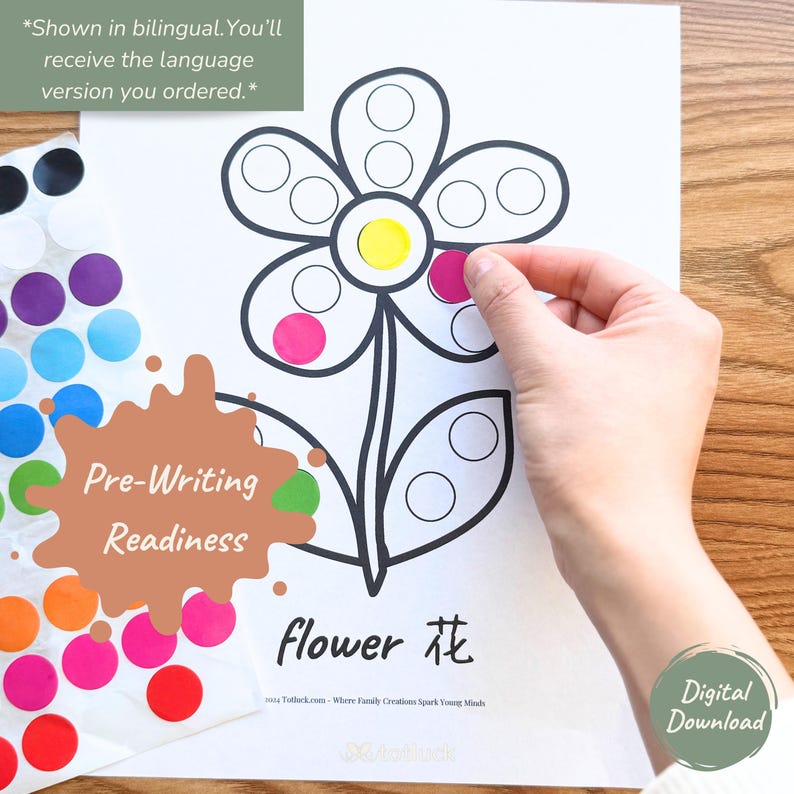 May include: A printable pre-writing readiness activity featuring a flower with circles for sticker placement. The flower is labelled "flower 花" and the text "Pre-Writing Readiness" is in a green and brown splatter design.
