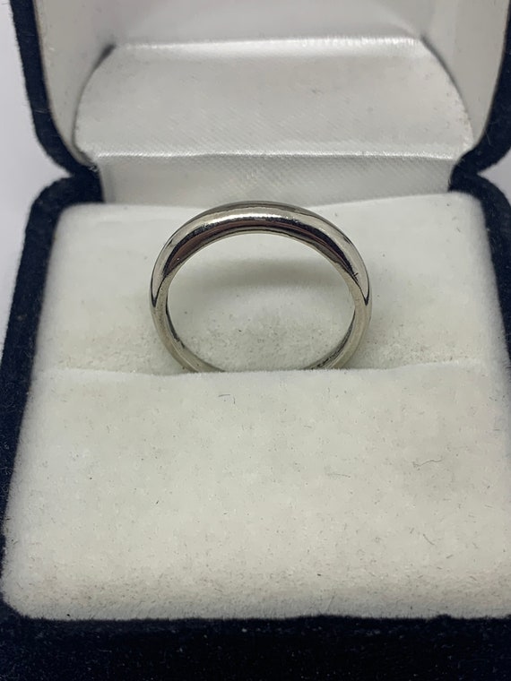 Tapered 10kt white gold wedding band