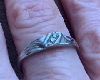 Wedding band, white gold,  vintage, three diamonds,1.6 gms, , size 7, hallmark, weighs 1.6gms