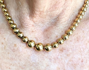 Graduated beads, Gold filled vintage 16” on chain, classic elegance.
