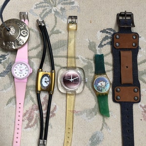 watch assortment, 4 watches in all, 3 are quartz and one is mechanical, from the ‘60 to the 70’s. Plus a great free hippie ‘70s band.