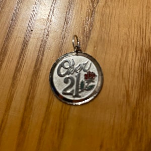 Over 21 vintage sterling charm