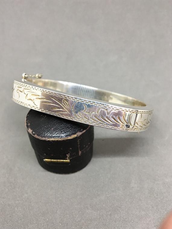 Vintage opening bangle bracelet with engraved side