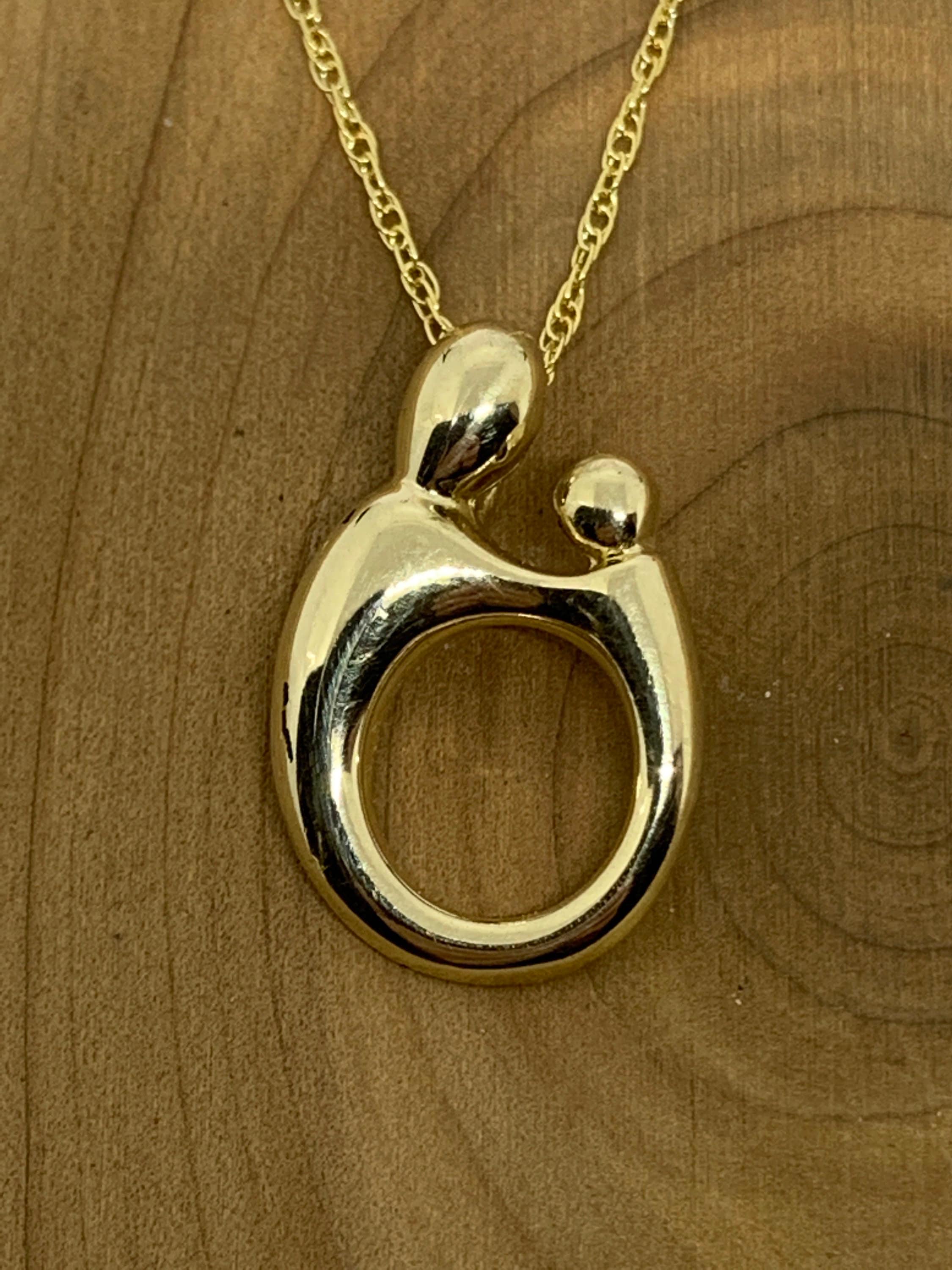 Janel russell mother deals and child pendant