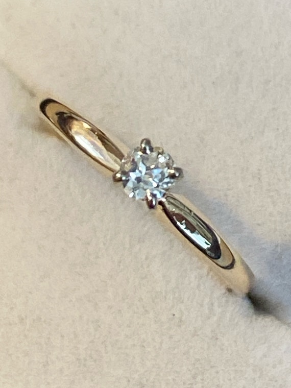 Diamond engagement ring. size  6 1/2. four prong, 