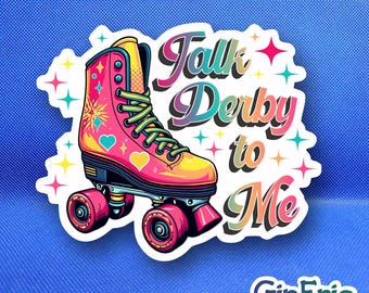 May include: A die-cut sticker featuring a pink and yellow roller skate with yellow laces, surrounded by colorful four-pointed stars. The text reads Talk Derby to Me in a gradient font. The sticker includes the text GinEric STICKERS.