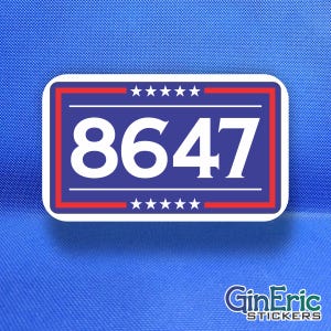 May include: A rectangular sticker with a blue background and white border. The center features the white number 8647. A red rectangular frame surrounds the number, with five white stars positioned above and below the central text.