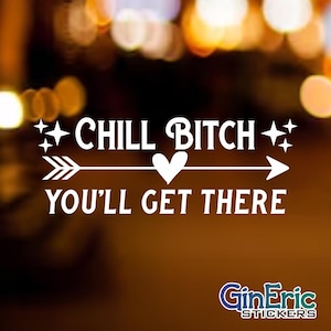 May include: White sticker with the text "CHILL BITCH YOU'LL GET THERE" in a stylized font. The text is centered with an arrow and heart design. The sticker has a blurred, dark background with bokeh lights.