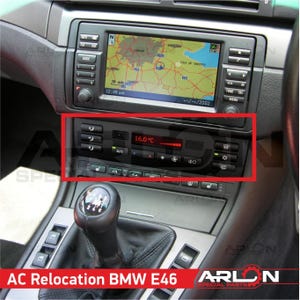 May include: A black car dashboard with a navigation system and a climate control panel. The climate control panel has a digital display showing 16.0°C and buttons for adjusting the temperature, fan speed, and air flow.