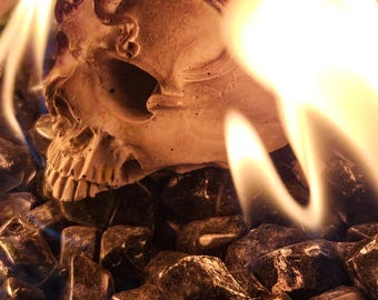 Hand poured refractory cement Fire Pit Octopus Wrapped Skull