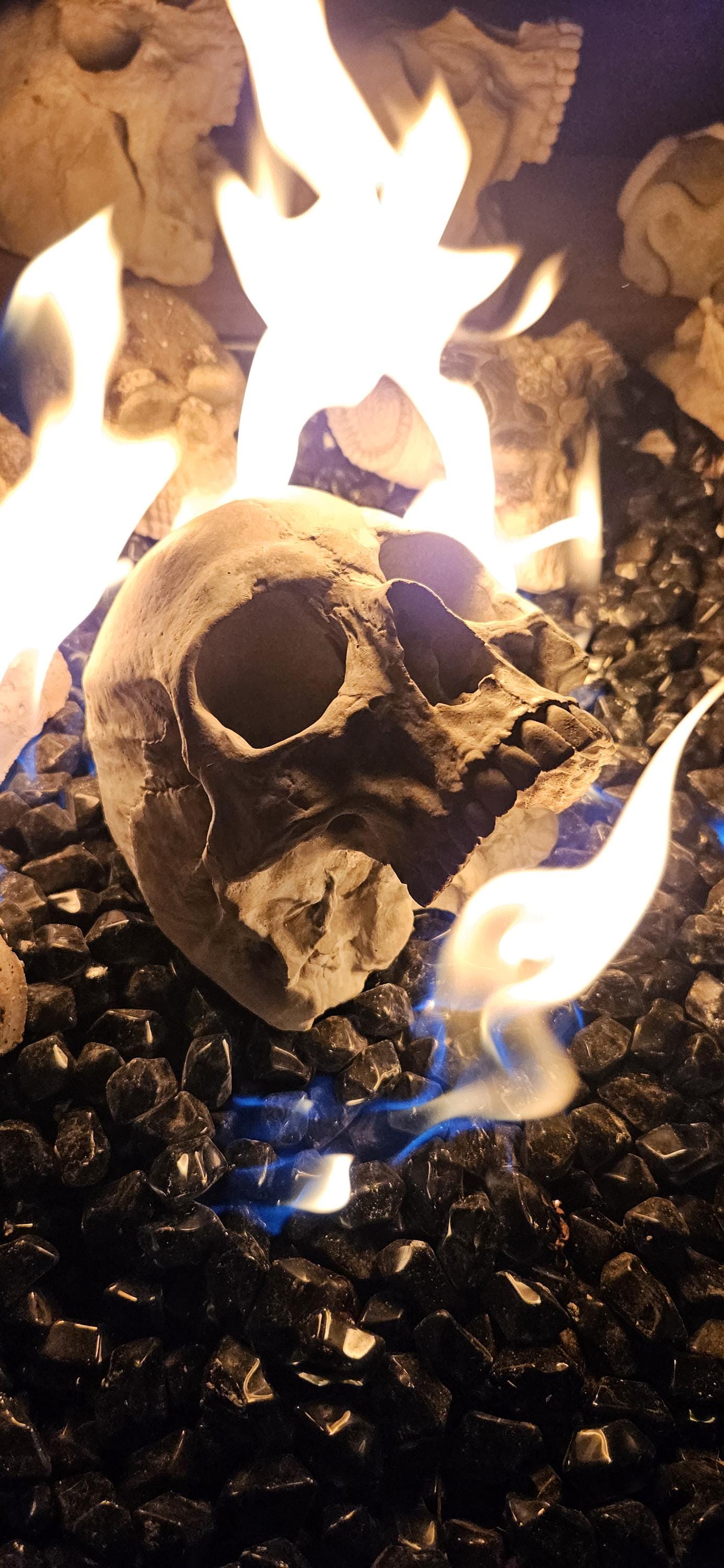 Fire pit skull. Full size replica of a Human Skull. Flat back no mandible. Hand poured with refractory cement. Temps up to 2300 degrees.