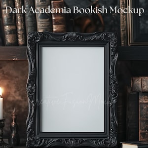 May include: A black ornate picture frame with a white interior, set against a backdrop of antique books and a dark, moody aesthetic. The text "Dark Academia Bookish Mockup" is visible at the top.