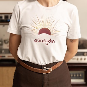 Good Morning &quot;Günaydın&quot; Sunrise White T-Shirt | Unique Turkish Graphic Tee | Minimalist Sun Design | Language Learner Gift - 100% Cotton