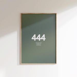 May include: A framed print with a green background and the number 444 in white text. The text below the number reads "Protection, Stability, Guidance."