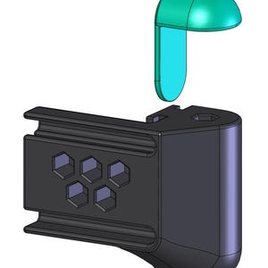 Peut inclure: Un objet imprimé en 3D en plastique noir avec un motif en nid d'abeille sur le côté. Un objet imprimé en 3D en plastique bleu sarcelle est fixé au sommet de l'objet noir.