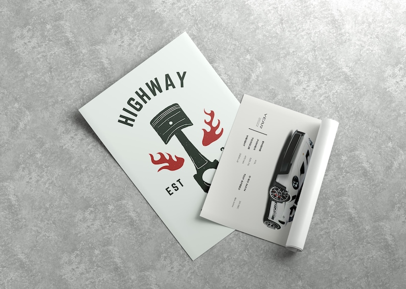 May include: A white poster with black text that reads "HIGHWAY EST" and a black and white illustration of a piston with red flames. A second white poster with black text and a black and white illustration of a car is partially visible.