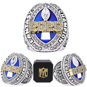 May include: A silver and blue championship ring with a blue and white football trophy, the year 2022, and the words "Fantasy Football League Champion" around the ring. The ring is in a black box with the letters "FFL" in white.