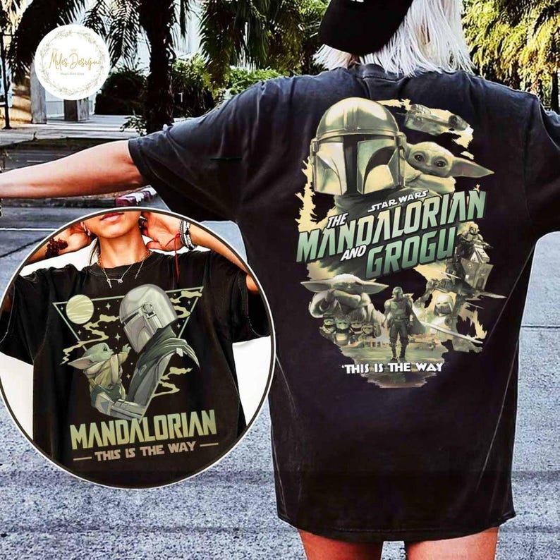 Peut inclure: T-shirt noir avec les personnages de Star Wars, Le Mandalorien et Grogu. Le design comprend le casque du Mandalorien et Grogu, avec le texte "This is the Way".