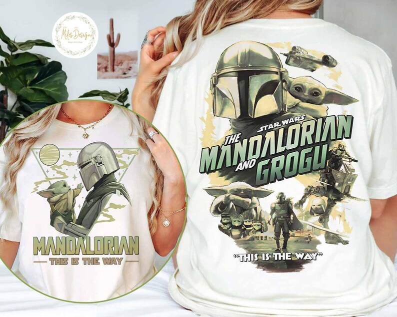 Peut inclure: T-shirt blanc avec un motif de The Mandalorian et Grogu de Star Wars. Le design comprend le texte "The Mandalorian and Grogu" et "This is the Way". Le t-shirt a un col rond et des manches courtes.