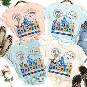 May include: Four light-colored t-shirts with a Disney castle graphic, Mickey Mouse characters, and the text "Graduate from the tassel to the castle" and "2025".