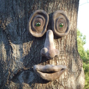 Concrete Tree Face Garden Decor with Emerald Green Eyes
