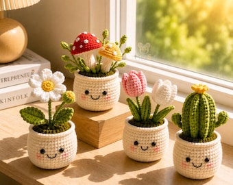 May include: Four crocheted potted plants with smiling faces. One pot holds a white daisy, one holds red and yellow mushrooms, one holds pink and white tulips, and one holds a green cactus with a yellow flower. Each pot is white with embroidered eyes and pink cheeks.