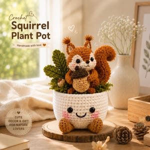 May include: A crochet squirrel plant pot featuring a white, smiling face with pink cheeks, holding a brown acorn. The squirrel has tufted ears and a bushy tail, surrounded by green crocheted leaves. Text reads: Crochet Squirrel Plant Pot, Handmade with love, CUTE DECOR & GIFT FOR NATURE LOVERS.