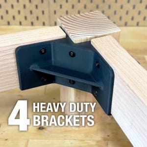 May include: Four heavy-duty black brackets are shown, each connecting two wooden beams at a 90-degree angle. The brackets are secured with black screws. The text "4 HEAVY DUTY BRACKETS" is displayed in white.