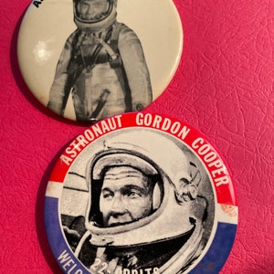 Astronauts John Glenn and Gordon Cooper commemorative buttons. 1960’s