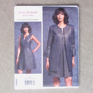 May include: A Vogue Patterns sewing pattern by Isaac Mizrahi, featuring a design for a dress and jacket. The pattern cover displays a woman modeling the outfit. The dress is sleeveless with a V-neck, and the jacket has flared sleeves.