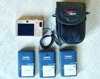 Canon PowerShot SD1000 Digital Elph 7.1MP Camera, 3 Canon Batteries & Chargers, Ritz Carrying Case, Crisp Clear Photos, 5 Movie Modes, Used