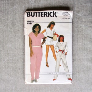 May include: A vintage sewing pattern for a jumpsuit, featuring a pink jumpsuit with a V-neck and a white belt, a white jumpsuit with a scoop neck and a white belt, and a striped jumpsuit with a scoop neck and a red belt. The pattern is from Butterick, pattern number 6634, size 12-14-16, and is labeled "Fast & Easy".