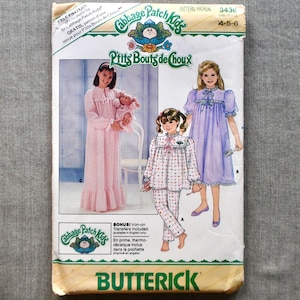 May include: Vintage Butterick sewing pattern for Cabbage Patch Kids pajamas and nightgowns. The pattern features illustrations of children in various sleepwear styles. Includes the text "P'tits Bouts de Choux" and "Cabbage Patch Kids". Sizes 4-5-6.