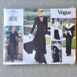 May include: A Vogue sewing pattern envelope labeled 1290 for sizes 12-14-16. The front displays photographs of a long-sleeved black coat or dress with white ruffled cuffs and collar details, showcasing various styling options for the garment design.