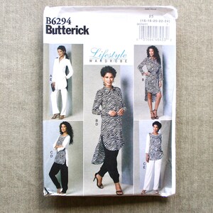 May include: A Butterick sewing pattern envelope, featuring a "Lifestyle Wardrobe" design. The envelope displays various clothing styles, including a white outfit, a zebra-striped tunic, and a dress. The pattern number is B6294.