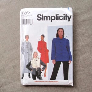 May include: A Simplicity sewing pattern envelope, number 8395, size P (12, 14, 16). The white paper packaging features illustrations of four different jacket and coat styles in blue, red, grey, and a two-tone black and white color scheme.