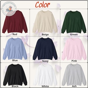 K&ouml;nnte beinhalten: Neun Sweatshirts mit Rundhalsausschnitt in verschiedenen Farben: Rot, Beige, Gr&uuml;n, Blau, Marine, Rosa, Schwarz, Wei&szlig; und Asch. Das Wort "Color" steht oben. Das Markenlogo befindet sich oben links.
