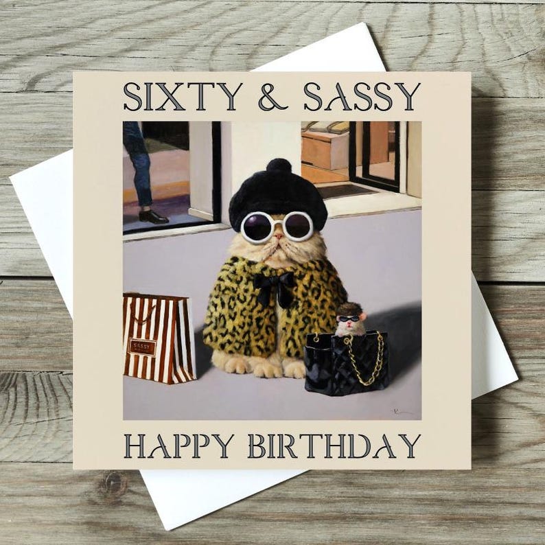 May include: A birthday card featuring a cat wearing a leopard print coat, sunglasses, and a hat. The cat is holding a shopping bag and standing next to a smaller cat holding a purse. The card says "Sixty & Sassy" and "Happy Birthday".