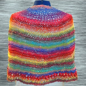 May include: A colorful crocheted shawl with a rainbow striped pattern. The shawl is made with a delicate open stitch and has a scalloped edge.