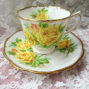 VINTAGE Royal Albert English Bone China Teacup and Saucer Tea Rose Pattern,Lush Yellow Roses,Lavish Gold Trim, Pedestal Cup and Saucer