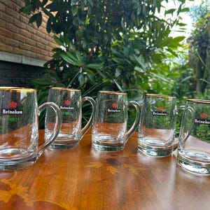 Thick glass beer mug showing quality construction and gold rim