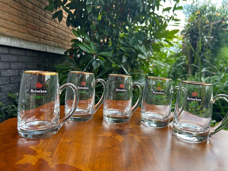 Thick glass beer mug showing quality construction and gold rim