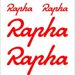 May include: Four red Rapha logos in a cursive font. The logos are arranged in a staggered pattern, with the largest logo at the bottom.